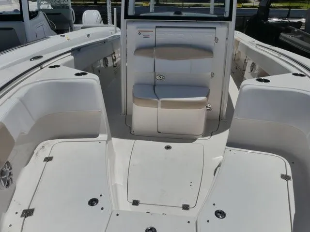 Slide: The Image of Interior view of a 2018 Robalo R302 Center Console boat. - 15