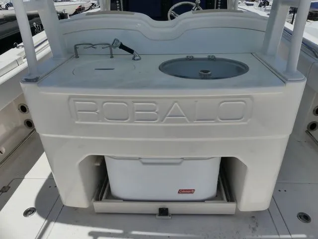 Slide: The Image of 2018 Robalo R302 Center Console with integrated sink and storage. - 7