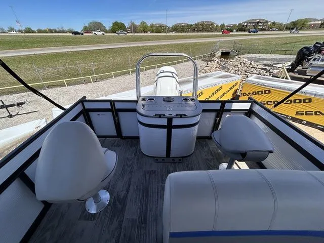Slide: The Image of Interior of a 2022 Qwest Pontoons 822 LT with seating area. - 12