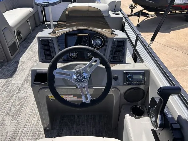 Slide: The Image of Interior view of 2022 Qwest Pontoons 822 LT helm. - 16