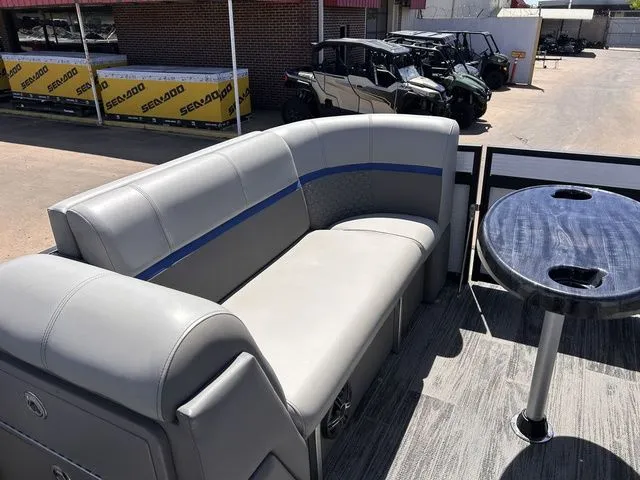 Slide: The Image of Interior of 2022 Qwest Pontoons 822 LT with gray sofa and table. - 19