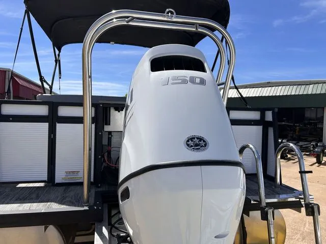 Slide: The Image of 2022 Qwest Pontoons 822 LT with outboard motor, rear view. - 5