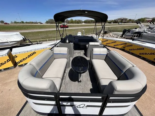 Slide: The Image of 2022 Qwest Pontoons 822 LT with spacious seating and Bimini top. - 8