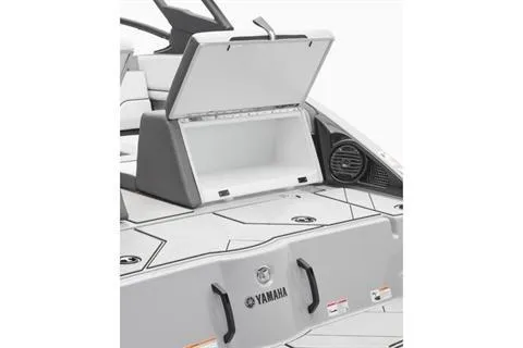 Slide: The Image of 2026 Yamaha Boats 252XE with open storage compartment and sleek design. - 9