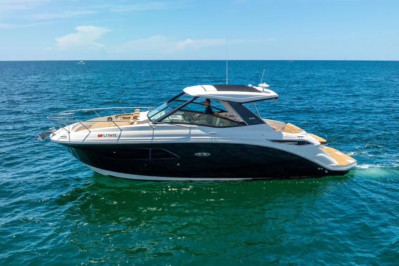 Slide: The Image of 2020 Sea Ray Sundancer 320 cruising on open sea. - 3