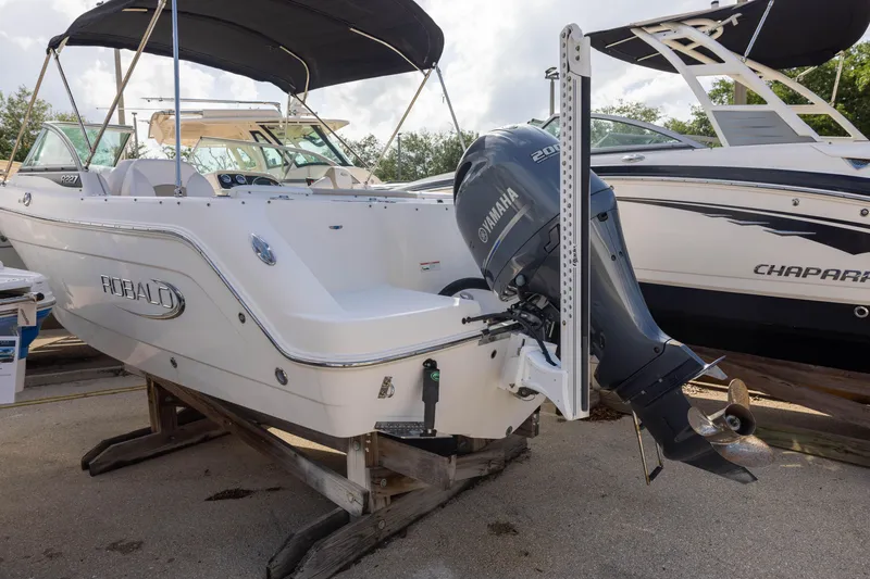 Slide: The Image of 2020 Robalo R227 Dual Console boat with Yamaha outboard motor on display. - 3
