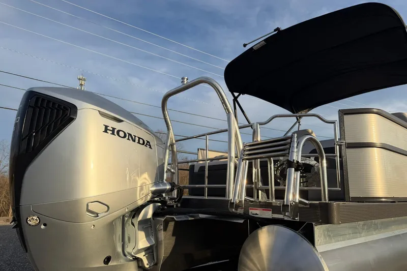 Slide: The Image of Silver Montego Bay ST8524 SB DLX pontoon boat with Honda engine, 2026 model. - 12