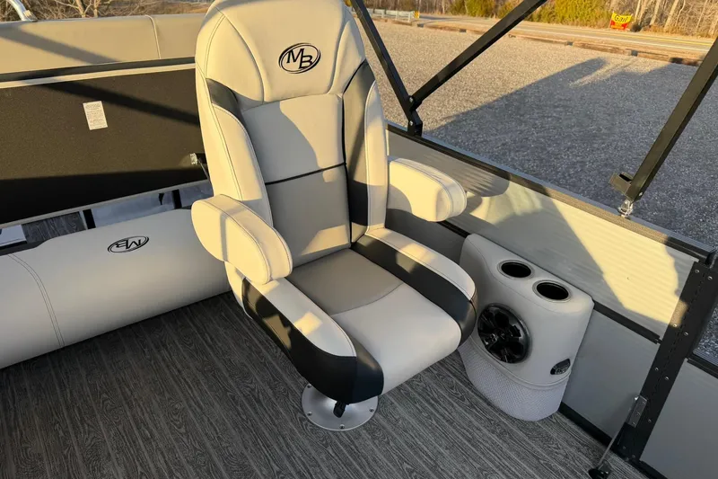 Slide: The Image of Luxury captain's chair on 2026 Montego Bay ST8524 SB DLX pontoon boat. - 16