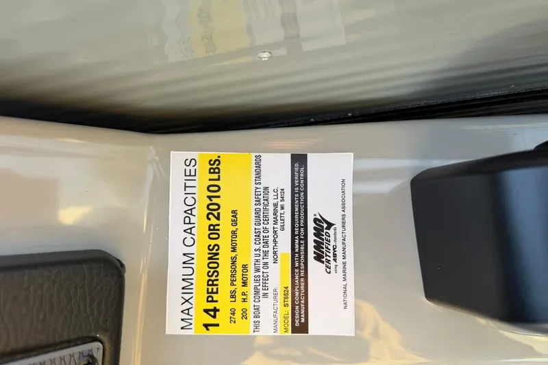Slide: The Image of Capacity label on Montego Bay ST8524 SB DLX, 2026 model, showing 14-person or 2010 lbs limit. - 22