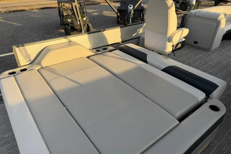 Slide: The Image of 2026 Montego Bay ST8524 SB DLX boat interior with luxurious seating and cup holders. - 25