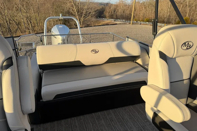 Slide: The Image of Luxurious seating on 2026 Montego Bay ST8524 SB DLX pontoon boat, featuring elegant design. - 26