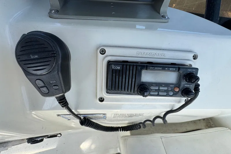 Slide: The Image of VHF marine radio on 1995 Silverton 31 Convertible boat dashboard. - 14