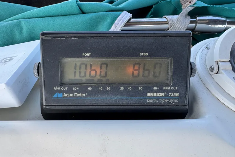 Slide: The Image of Digital tachometer on a 1995 Silverton 31 Convertible boat, displaying RPM readings. - 16