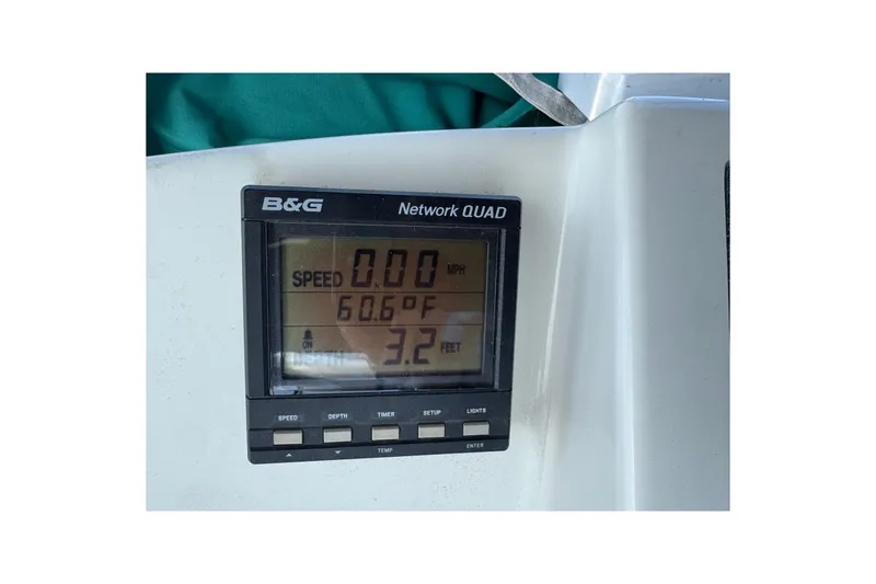Slide: The Image of B&G Network QUAD display on 1995 Silverton 31 Convertible, showing speed, temperature, and depth. - 17