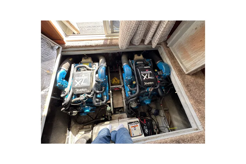 Slide: The Image of 1995 Silverton 31 Convertible engine compartment with twin Crusader XL engines. - 30