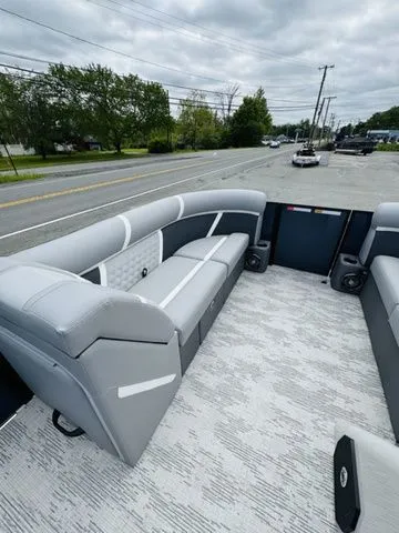 Slide: The Image of 2025 Crest Classic 220 SLRC pontoon boat with extended rear deck. - 16