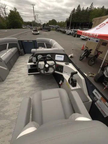 Slide: The Image of Interior view of a 2025 Crest Classic 220 SLRC pontoon boat. - 24