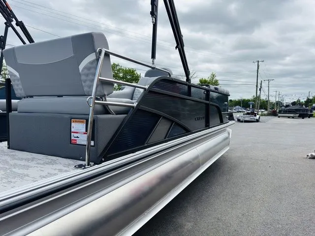 Slide: The Image of 2025 Crest Classic 220 SLRC pontoon boat with extended rear deck. - 29