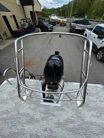Slide: The Image of 2025 Crest Classic 220 SLRC boat with 90hp motor on trailer. - 32