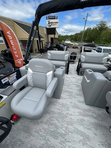 Slide: The Image of 2025 Crest Classic 220 SLRC pontoon boat with gray seating. - 6
