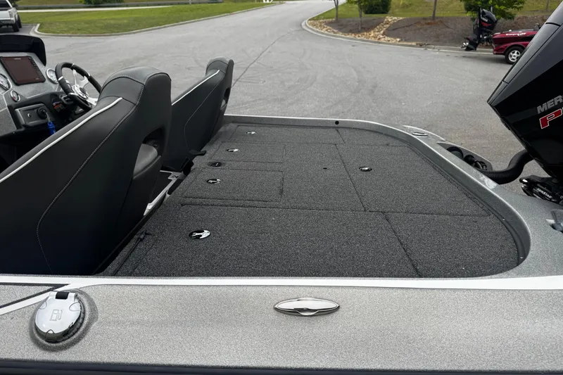 Slide: The Image of 2023 Nitro Z19 boat interior with seating and storage compartments. - 11