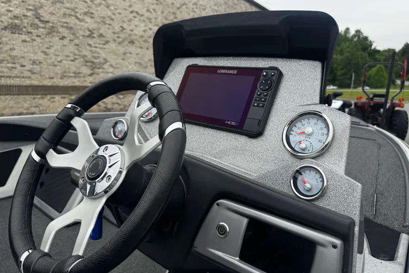 Slide: The Image of Steering console of 2023 Nitro Z19 boat with gauges and Lowrance display. - 15
