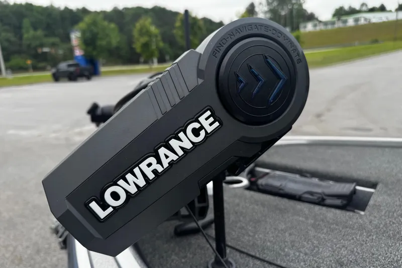 Slide: The Image of Lowrance device on 2023 Nitro Z19 boat, outdoor setting with blurred background. - 7