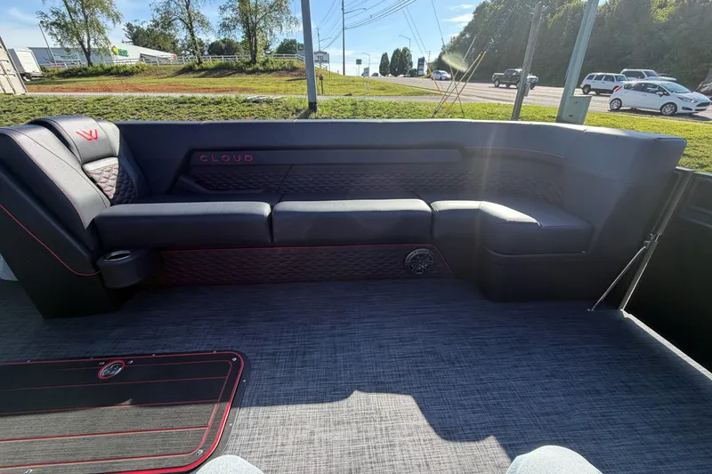 Slide: The Image of Luxurious seating on 2026 Whisper C25 Splash Pad boat, featuring sleek design and comfortable upholstery. - 12