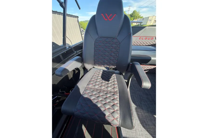 Slide: The Image of Luxurious black seat with red stitching in 2026 Whisper C25 Splash Pad boat. - 8