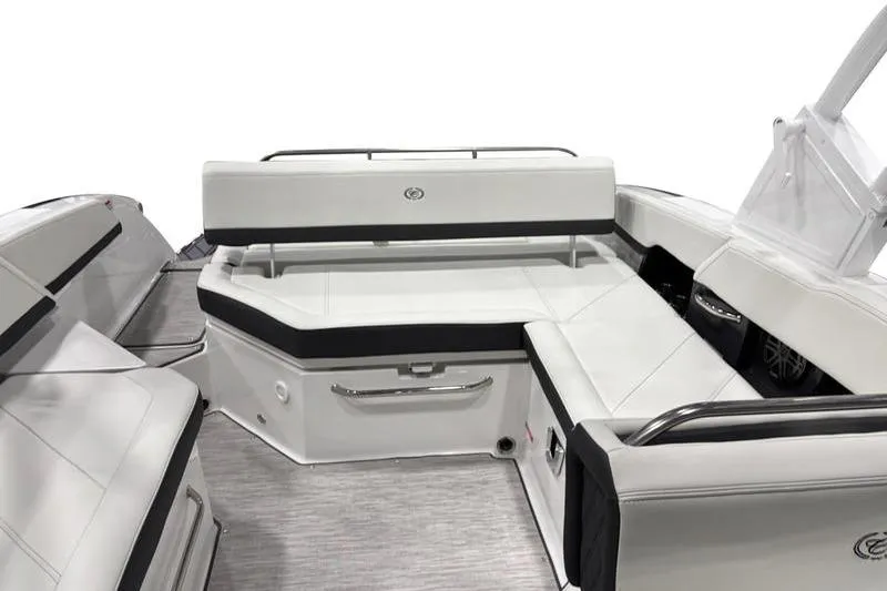 Slide: The Image of 2025 Cobalt R6 boat interior with sleek white seating and modern design. - 6