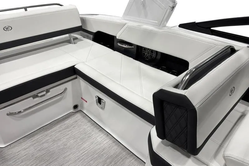 Slide: The Image of Luxurious interior seating of 2025 Cobalt R6 boat with sleek white upholstery. - 7