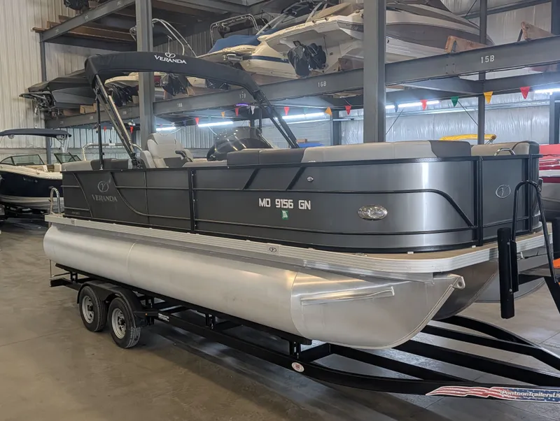 The Image of 2021 Veranda pontoon boat in warehouse on trailer. - 1