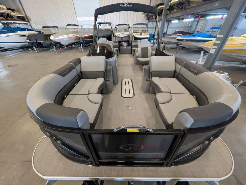 Slide: The Image of 2021 Veranda pontoon boat with luxurious interior in showroom. - 15