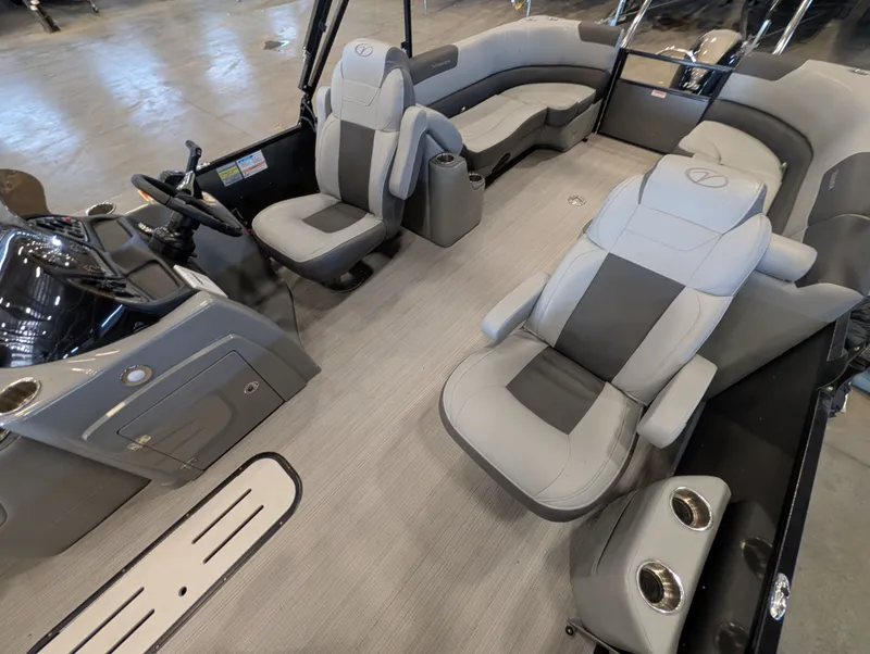 Slide: The Image of Interior of a 2021 Veranda pontoon with gray seating. - 19