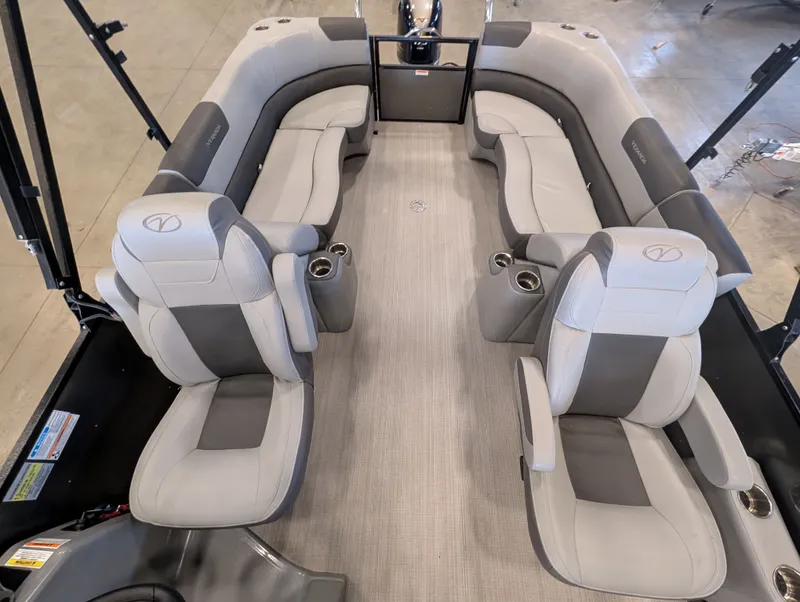 Slide: The Image of Interior of a 2021 Veranda pontoon with gray seating. - 21