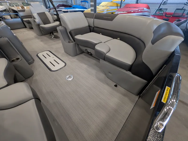 Slide: The Image of Interior of a 2021 Veranda pontoon with gray seating. - 22