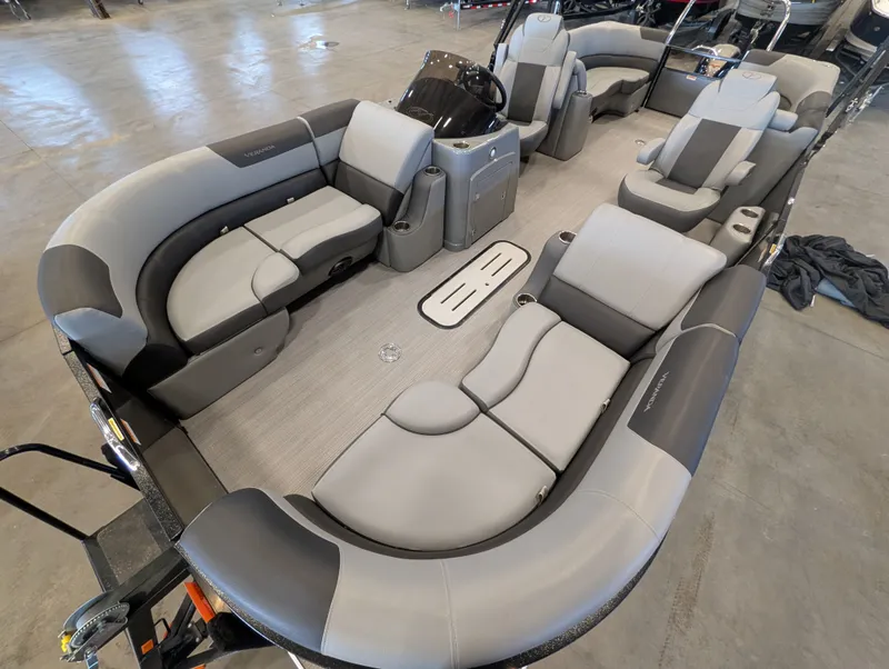 Slide: The Image of Interior view of a 2021 Veranda pontoon boat with gray seating. - 23
