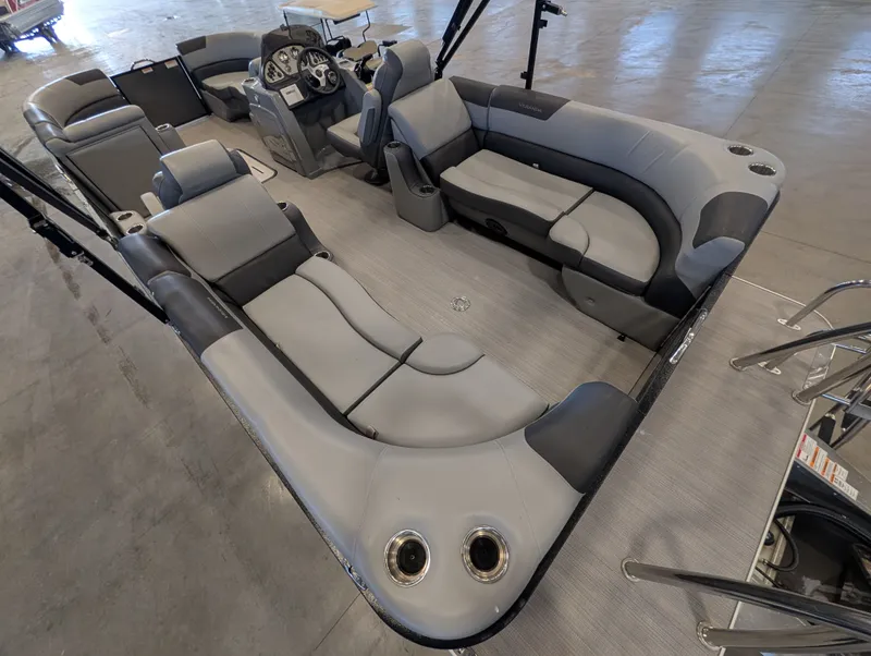 Slide: The Image of Interior of a 2021 Veranda pontoon boat with gray seating. - 24
