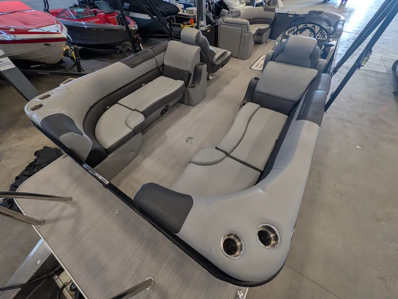 Slide: The Image of Interior of a 2021 Veranda pontoon boat with gray seating. - 25