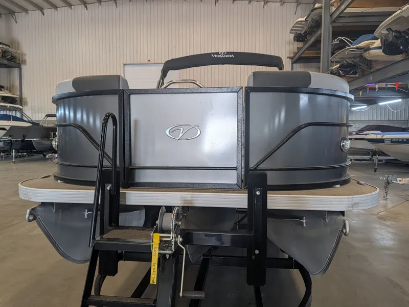 Slide: The Image of 2021 Veranda pontoon boat in a storage facility. - 5