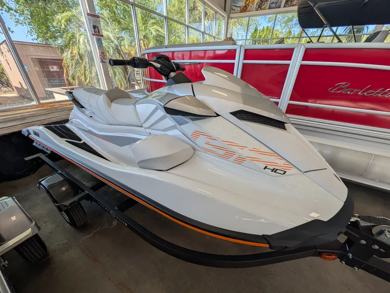 The Image of 2026 Yamaha GP1900A-CA jet ski displayed in showroom. - 1