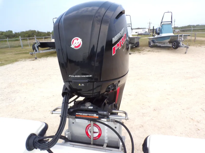 Slide: The Image of 2022 Mako 18 LTS with Mercury Pro outboard motor. - 12