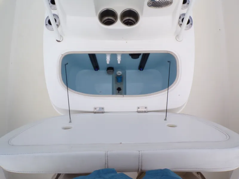 Slide: The Image of Interior view of a 2022 Mako 18 LTS boat with storage compartment. - 7