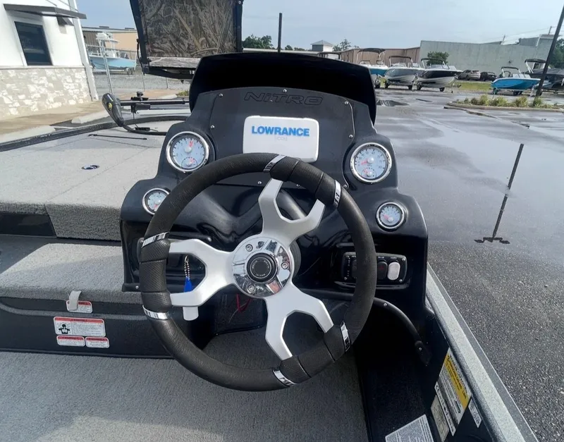 Slide: The Image of Steering wheel of a 2022 Nitro Z17 boat with Lowrance technology. - 12