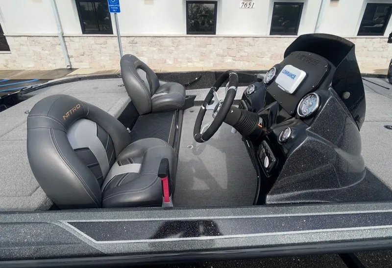 Slide: The Image of Interior of a 2022 Nitro Z17 boat with gray seats. - 13