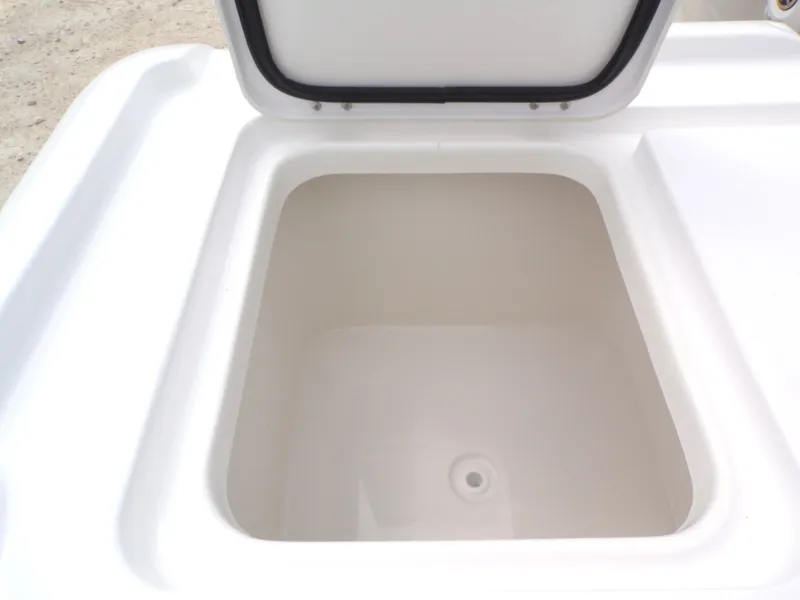 Slide: The Image of Open storage compartment in 2026 Tidewater 2500 Carolina Bay boat. - 40