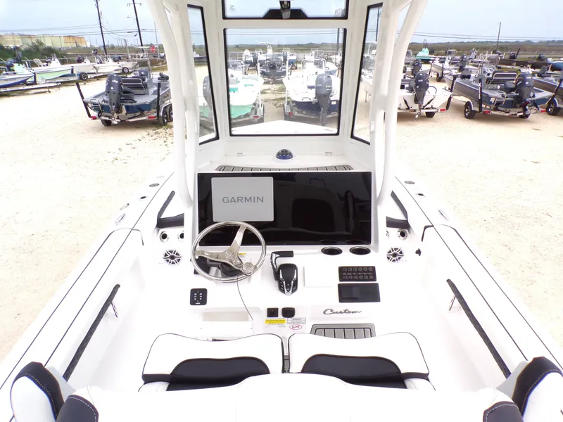 Slide: The Image of Interior view of 2026 Tidewater 2500 Carolina Bay boat with Garmin display. - 8
