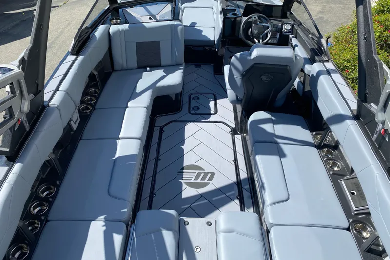 Slide: The Image of 2025 Malibu Wakesetter 23 LSV interior with spacious seating and modern design. - 10