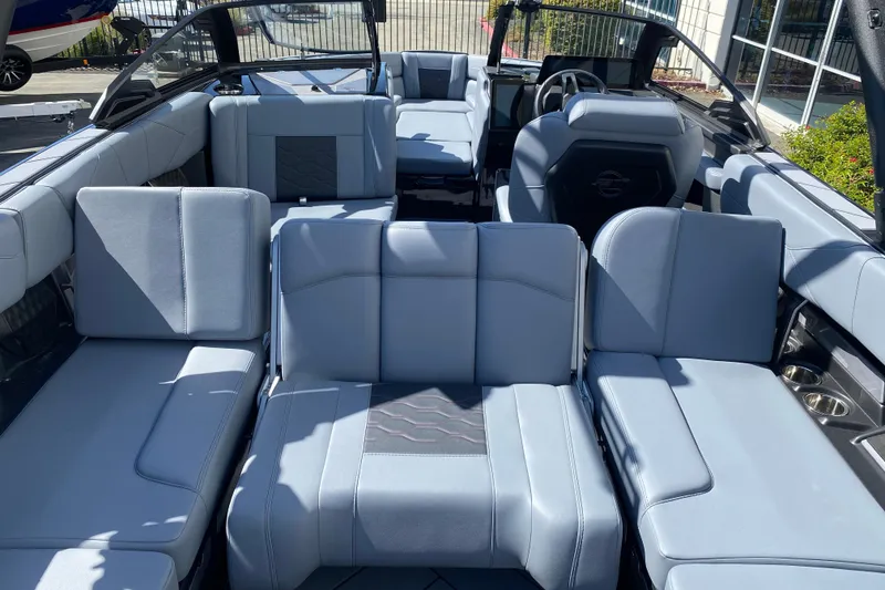Slide: The Image of 2025 Malibu Wakesetter 23 LSV interior with luxurious seating and modern design. - 15
