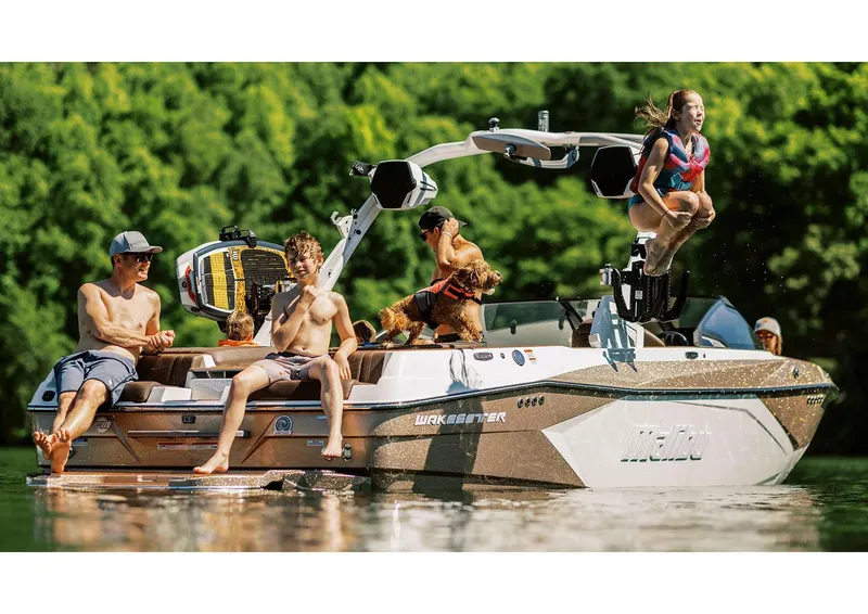 Slide: The Image of Manufacturer Provided Image: 2025 Malibu Wakesetter 23 LSV with people enjoying water activities. - 17